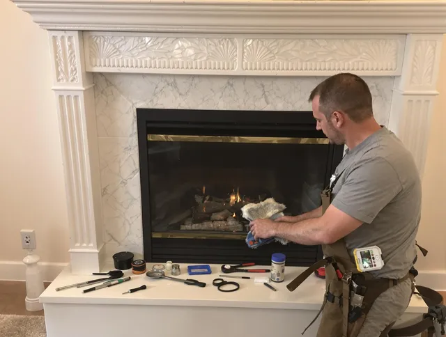 Tampa Chimney Sweep performing fireplace maintenance in Tampa, FL